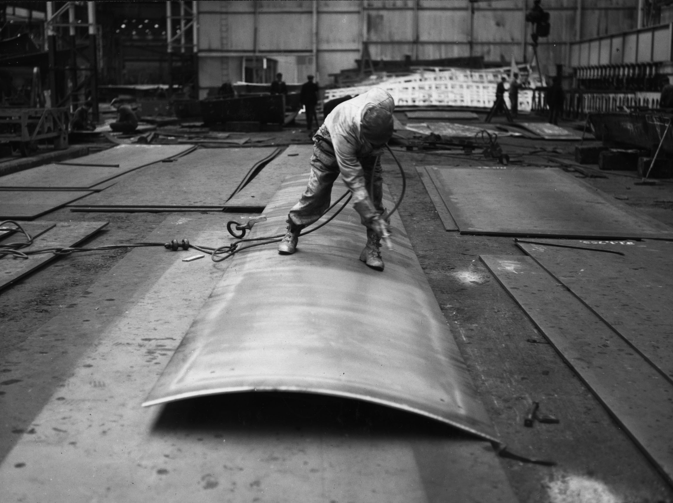 Commercial painter applying industrial coating